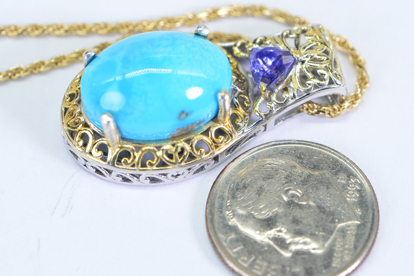 Sleeping Beauty Turquoise Tanzanite Pendant: 24K Gold Over Sterling Silver