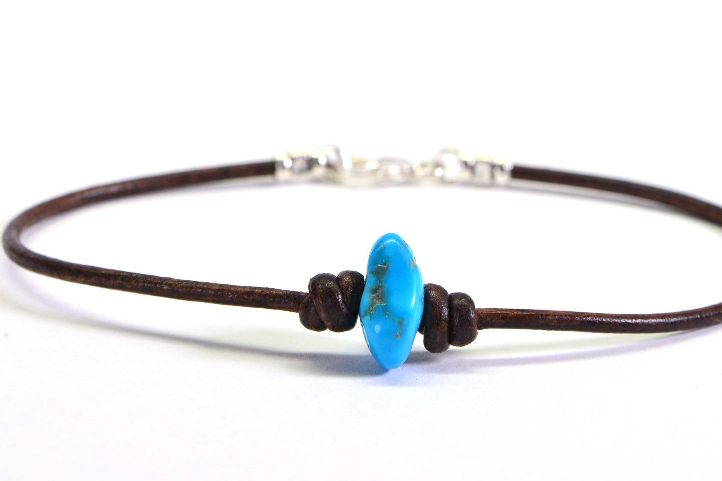 Sleeping Beauty Turquoise Bracelet: Leather Cord, Sterling Silver Clasp