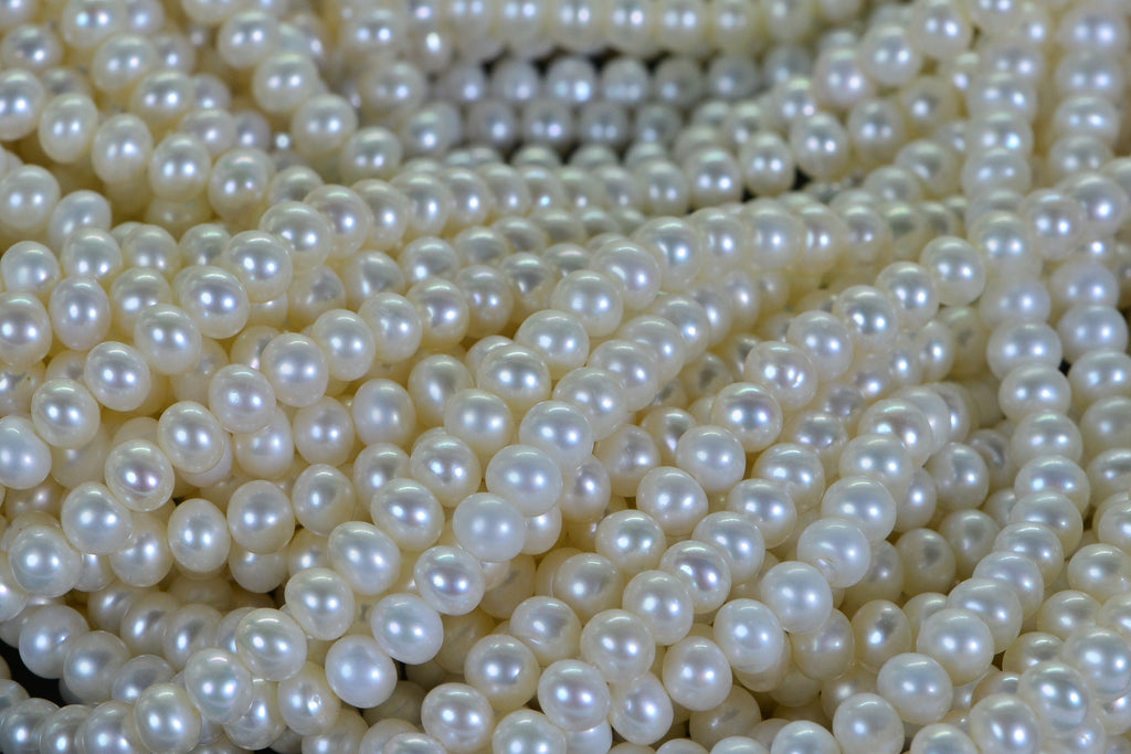 AAA White Freshwater Pearl Strand: 5.5mm Rondelle Beads