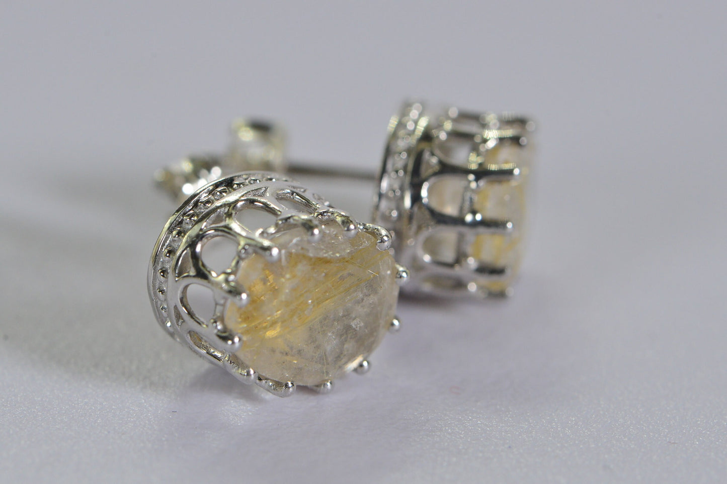 Golden Rutilated Quartz Stud Earrings: Sterling Silver, Oval Faceted Gem