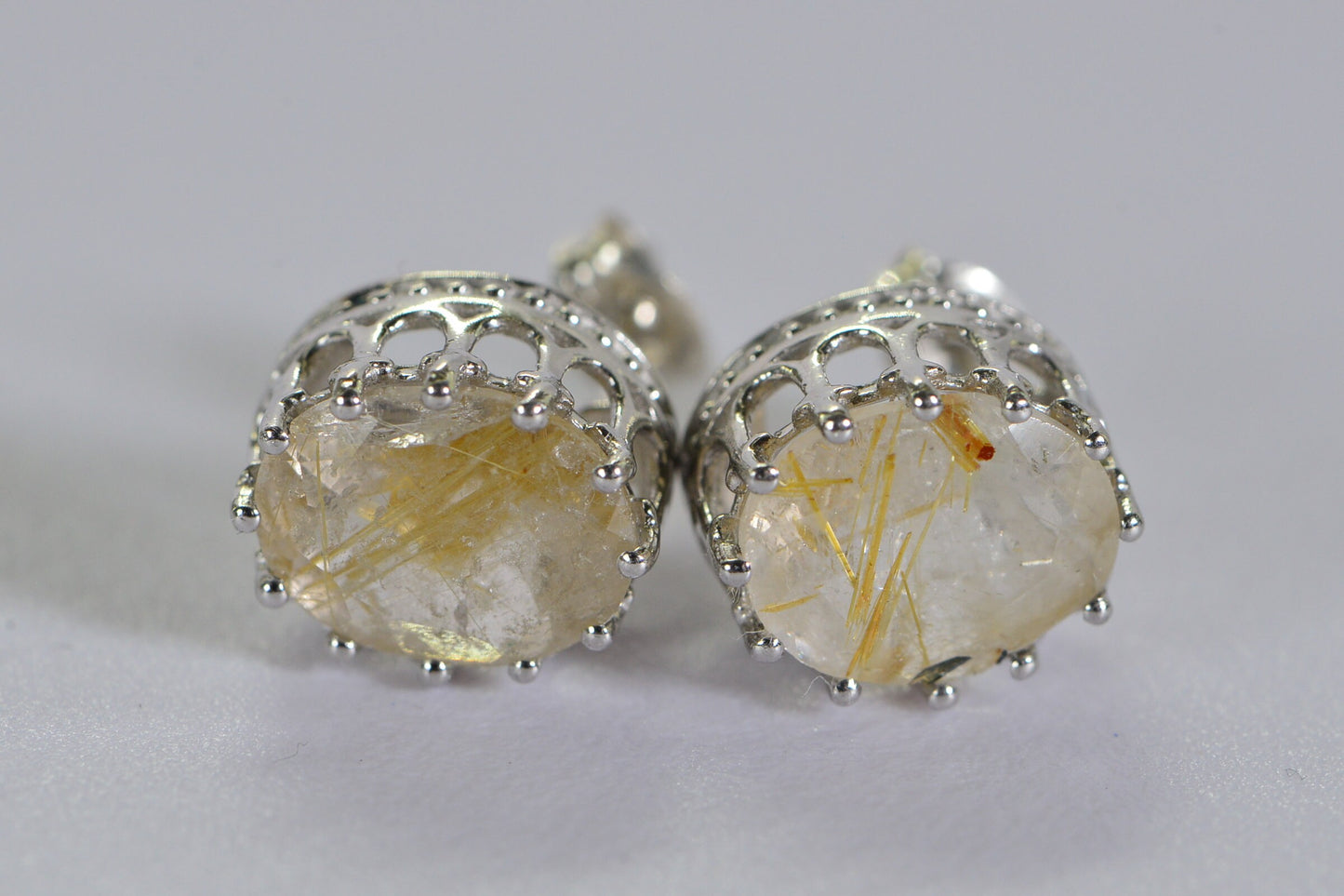 Golden Rutilated Quartz Stud Earrings: Sterling Silver, Oval Faceted Gem