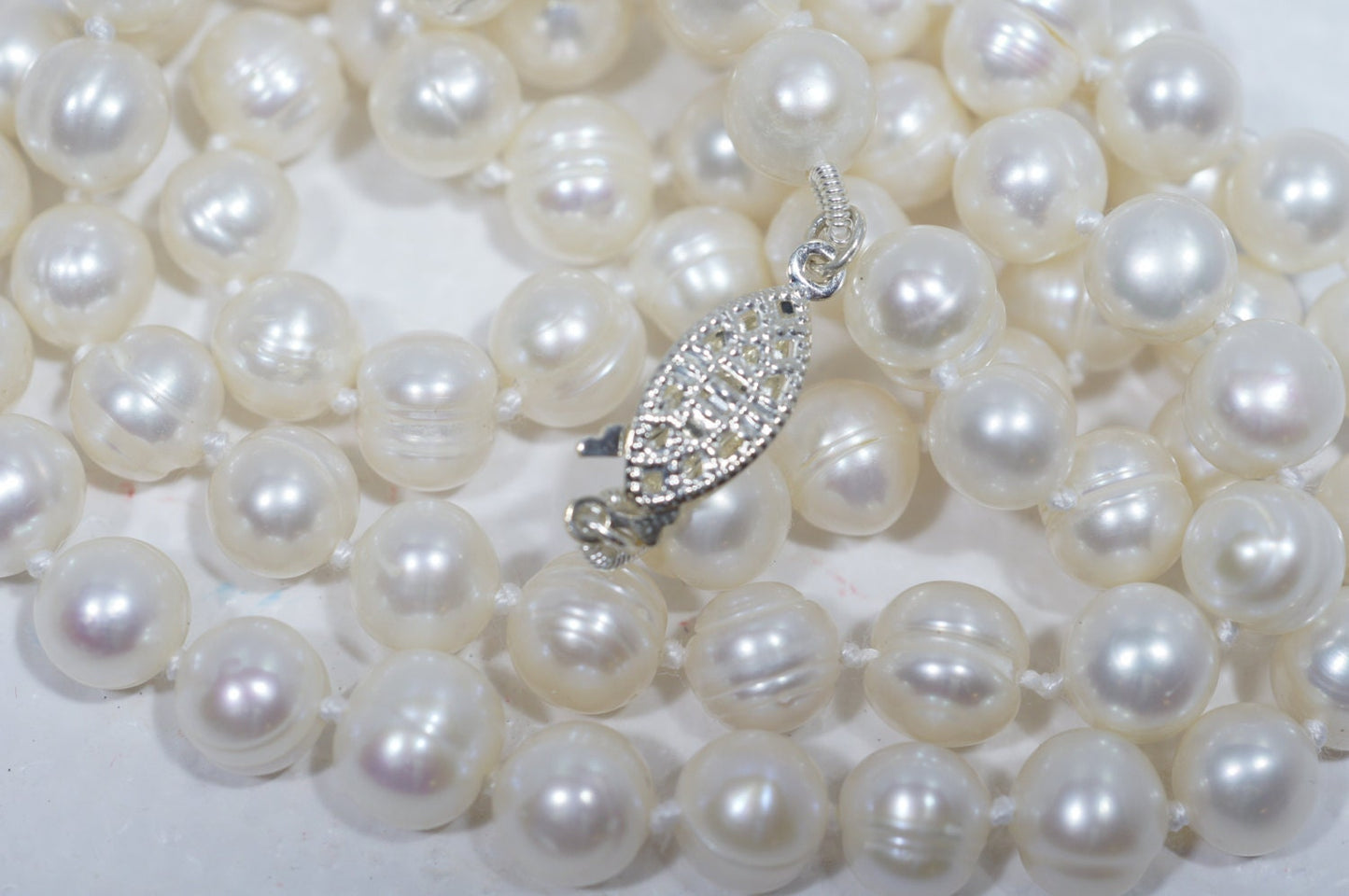 Freshwater Pearl Necklace: 7-8mm Knotted Pearls, Silver Clasp, 27 Inch
