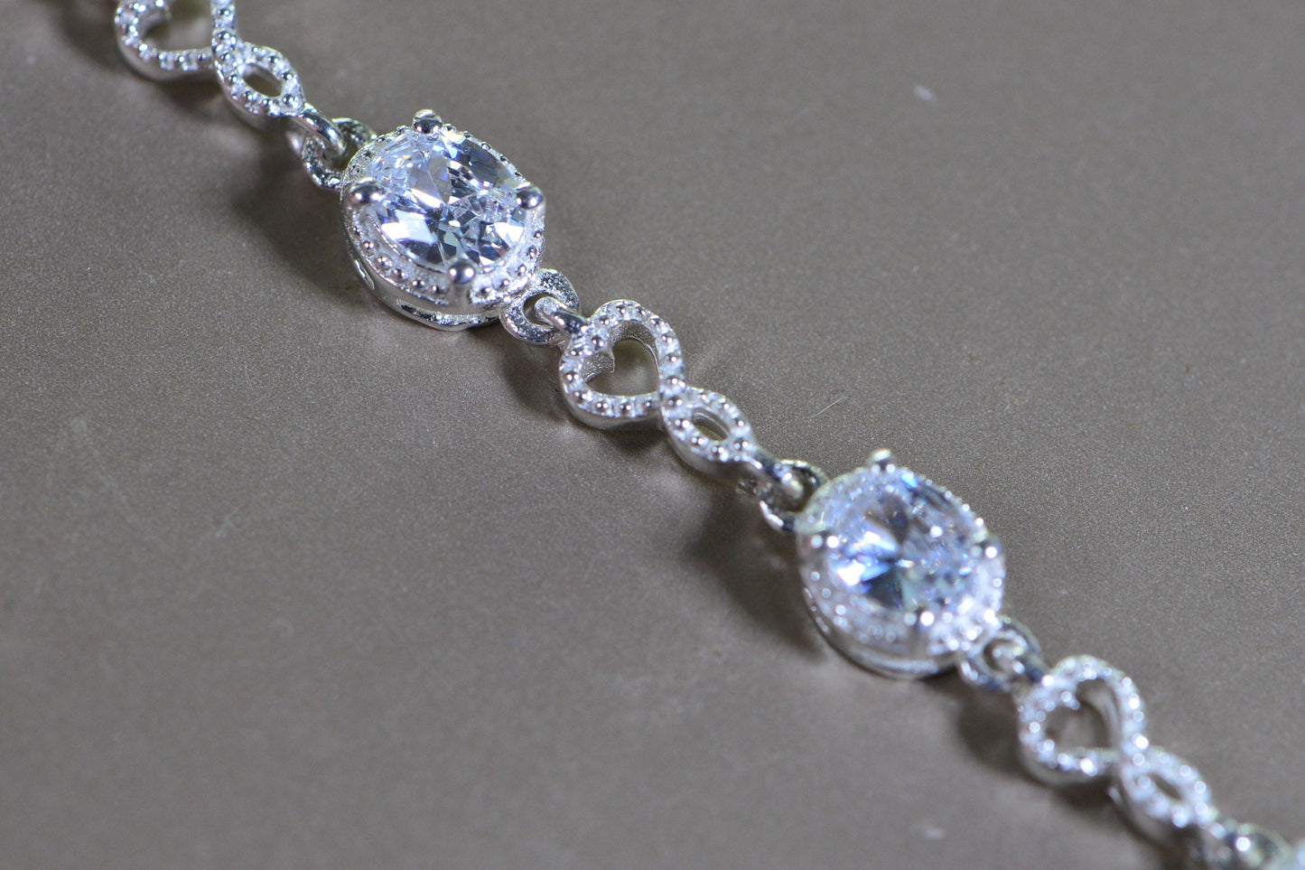 Simulated Diamond Tennis Bolo Bracelet: Rhodium Sterling Silver, Milgrain Infinity