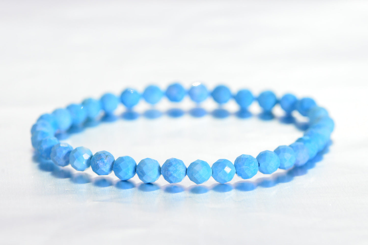 Sleeping Beauty Turquoise Bracelet: Faceted Baby Blue Healing Stone