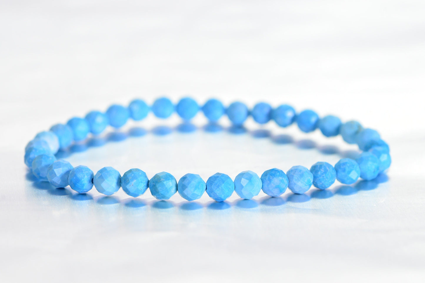 Sleeping Beauty Turquoise Bracelet: Faceted Baby Blue Healing Stone