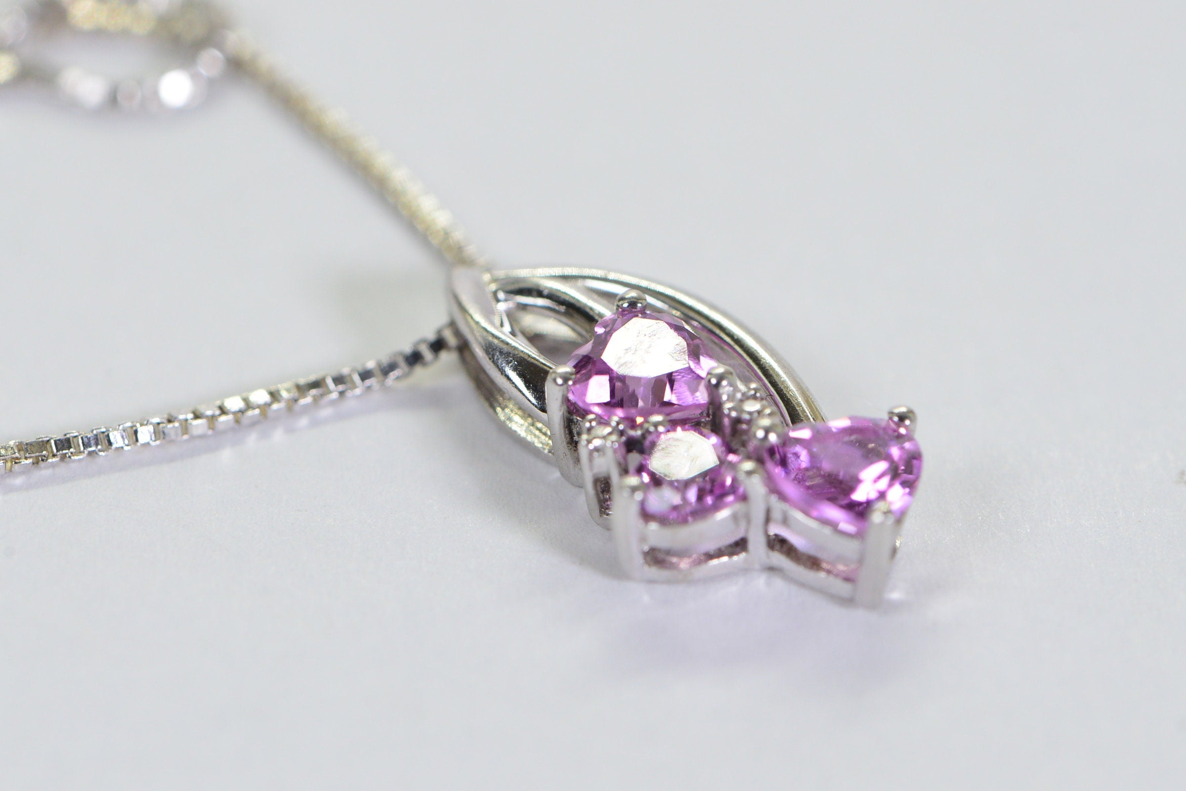 Pink Sapphire Three Hearts Pendant: Rhodium Sterling Silver Necklace