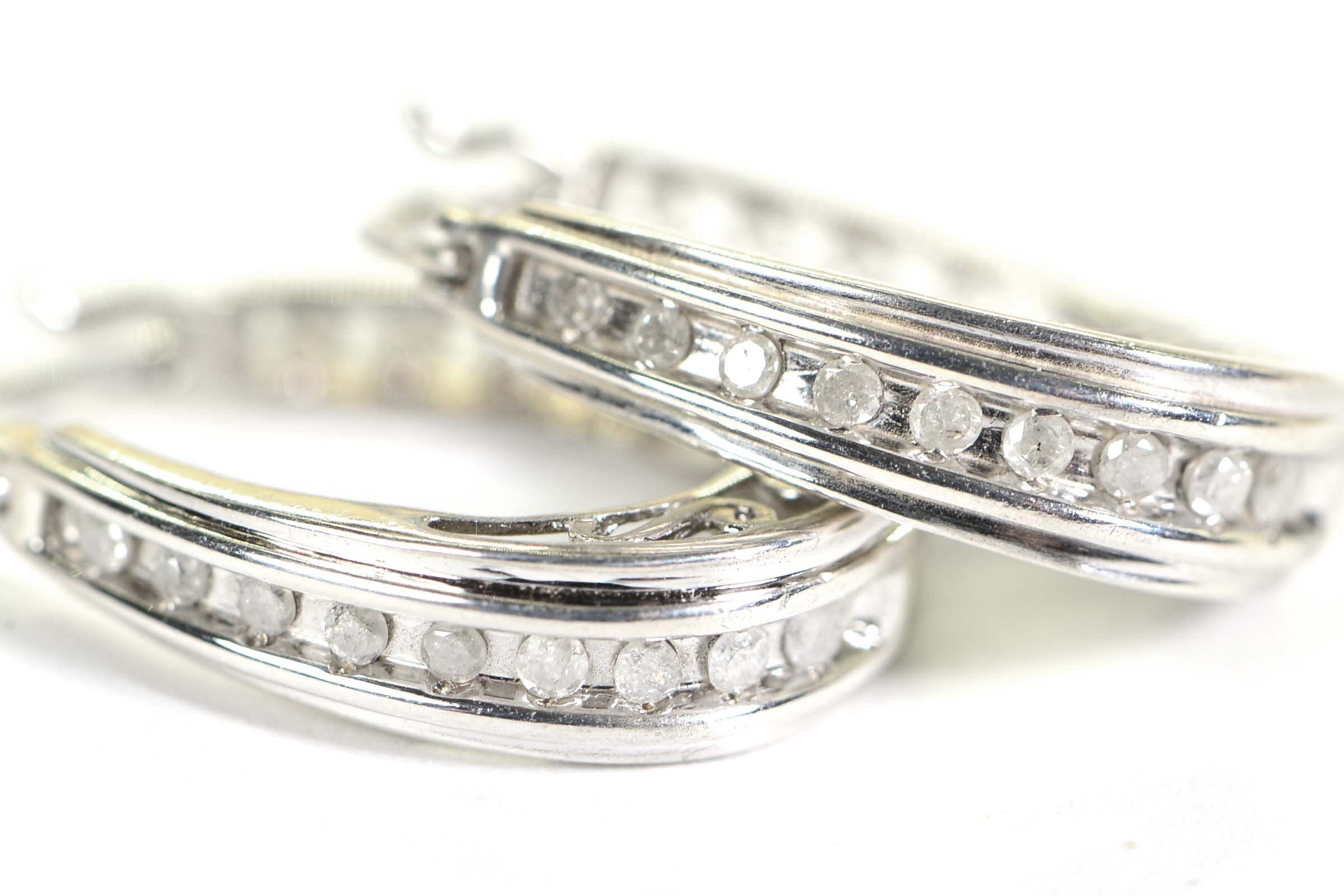 Sterling Silver Diamond Hoop Earrings: Filigree Heart Detail