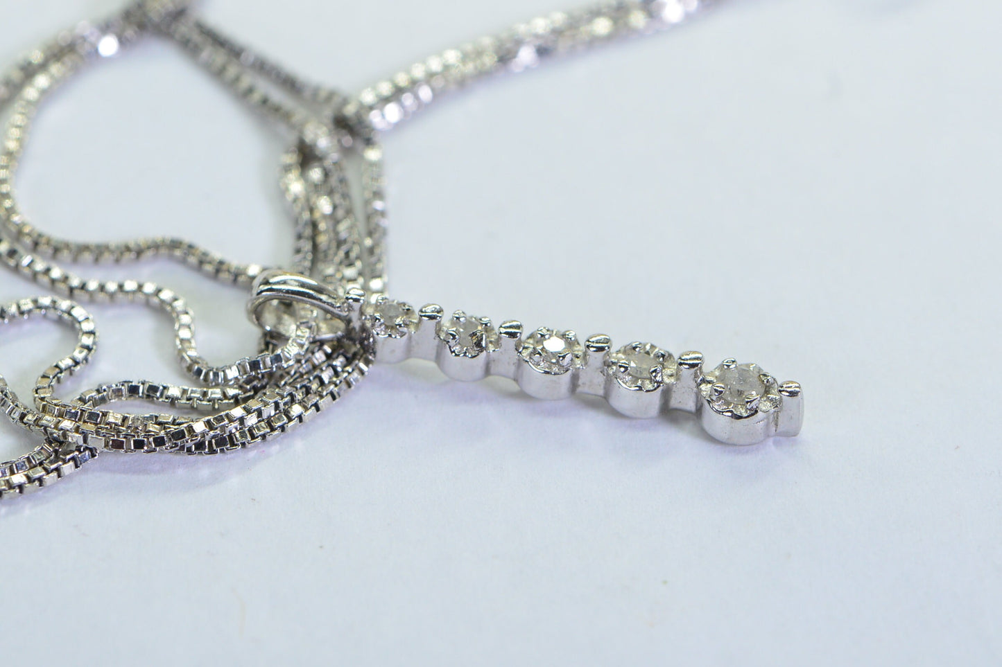 Five Diamond Stick Pendant: 14k White Gold over Sterling Silver