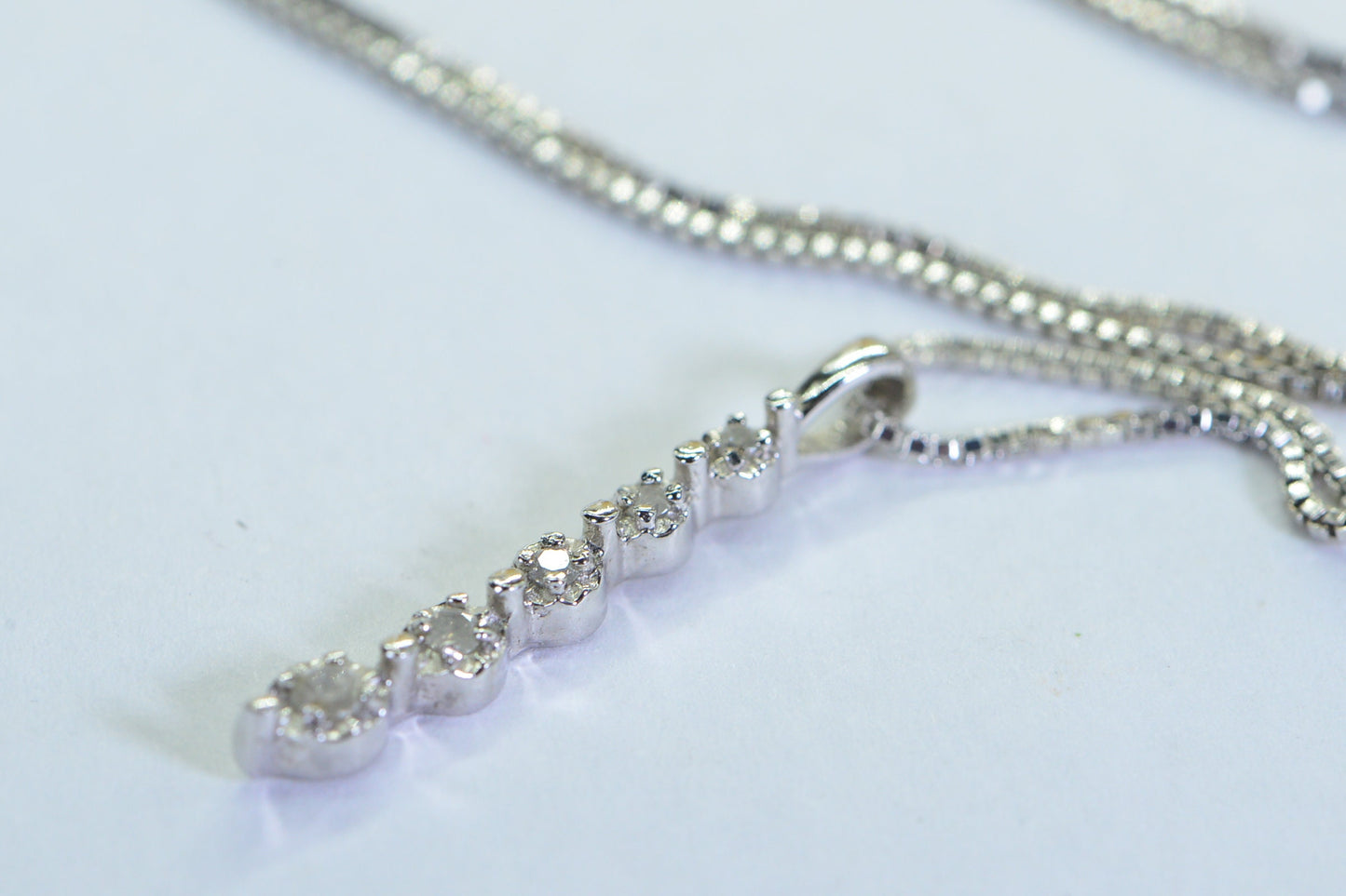 Five Diamond Stick Pendant: 14k White Gold over Sterling Silver