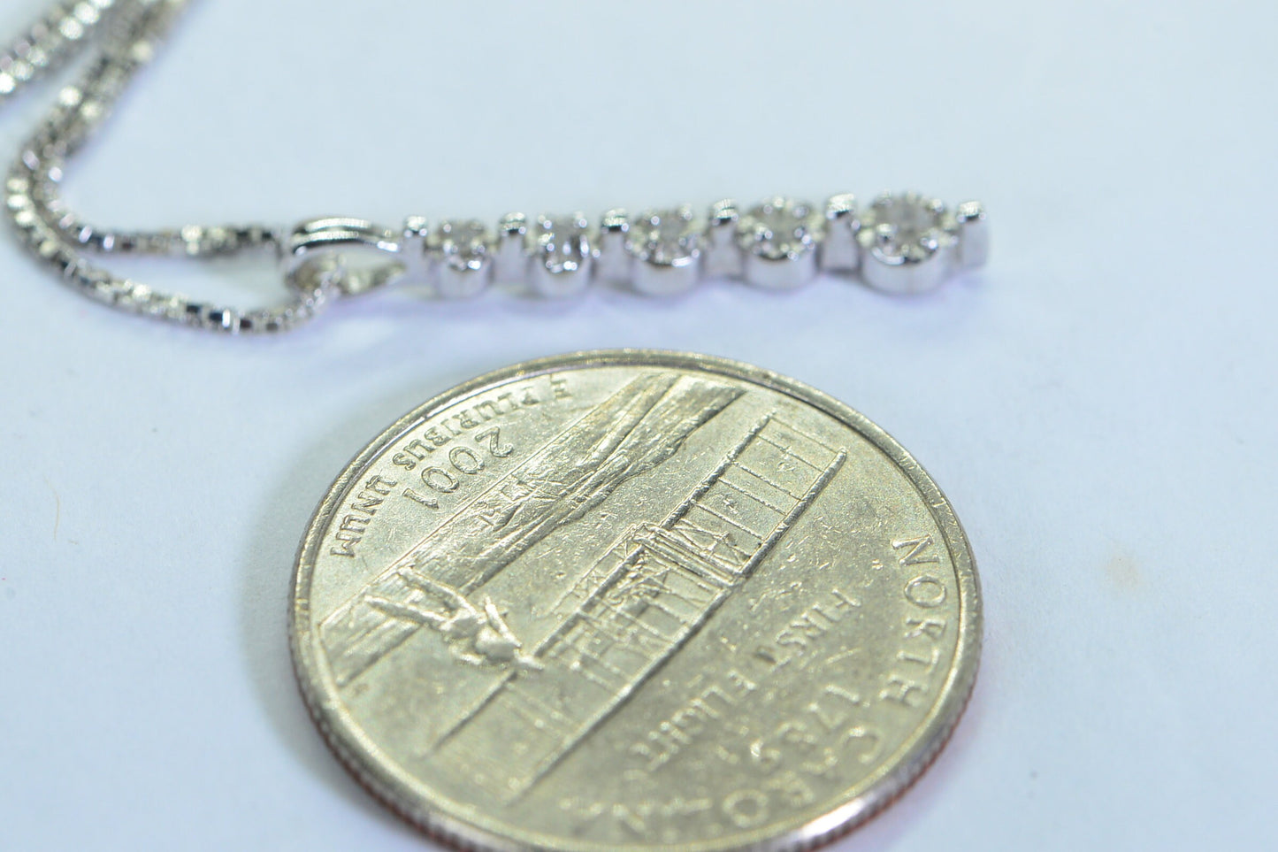 Five Diamond Stick Pendant: 14k White Gold over Sterling Silver