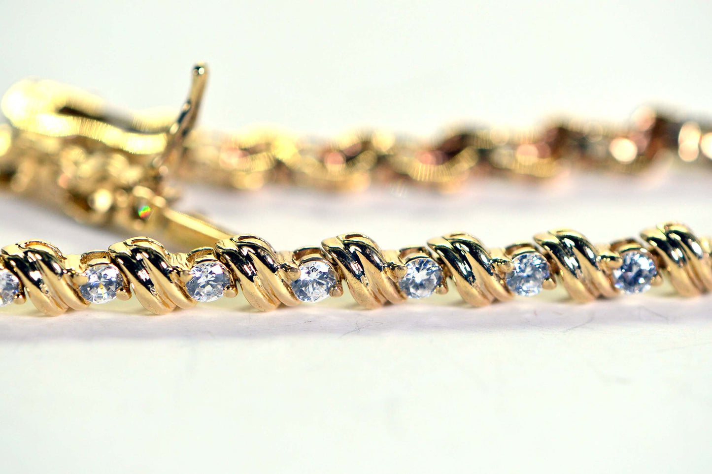 Simulated Diamond Tennis Bracelet: 18K Yellow Gold Over Sterling Silver