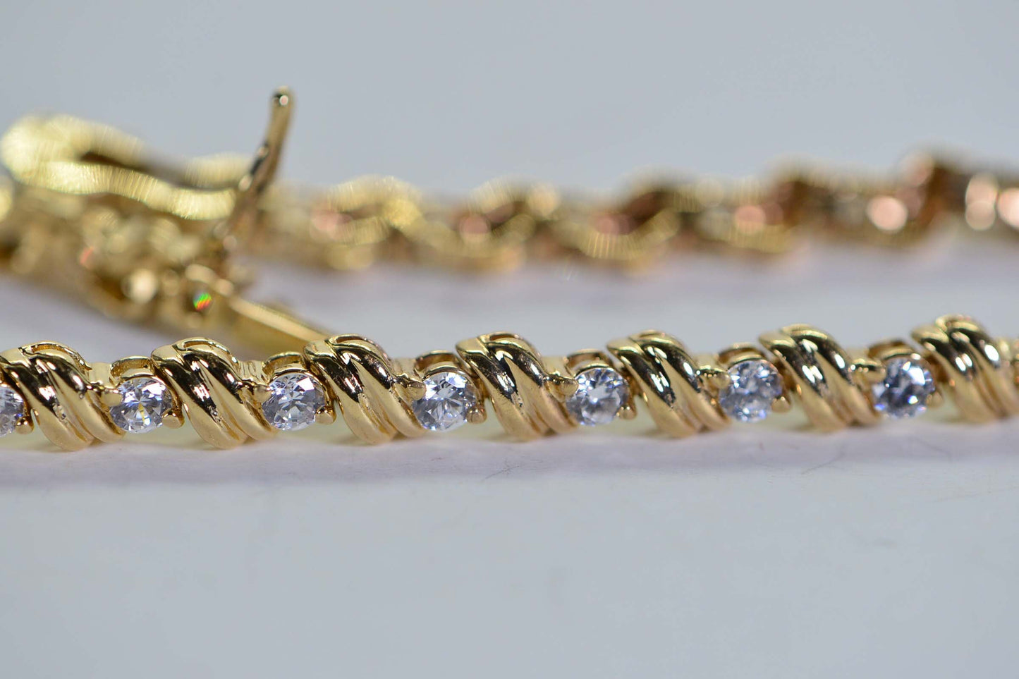 Simulated Diamond Tennis Bracelet: 18K Yellow Gold Over Sterling Silver