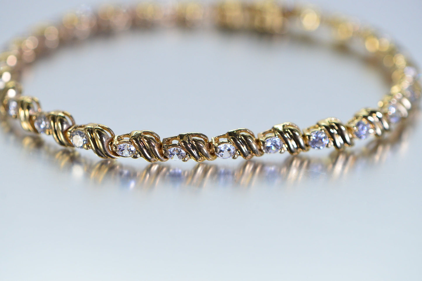 Simulated Diamond Tennis Bracelet: 18K Yellow Gold Over Sterling Silver