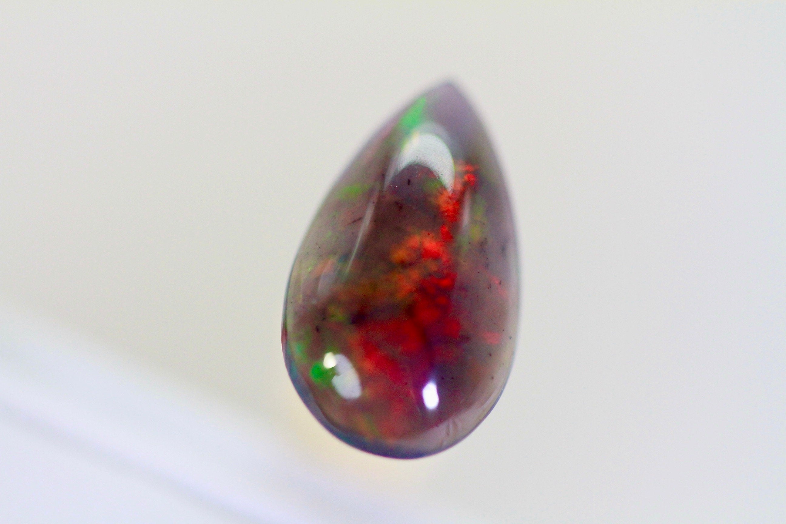 1.4 CT Ethiopian Black Welo Opal Pear Cabochon: Gemstone Jewelry Supply
