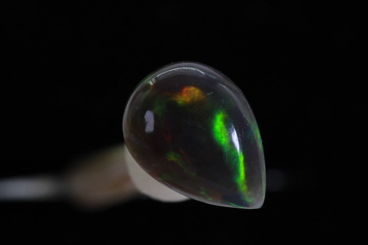 Ethiopian Black Welo Opal: Pear Cut Cabochon Gemstone