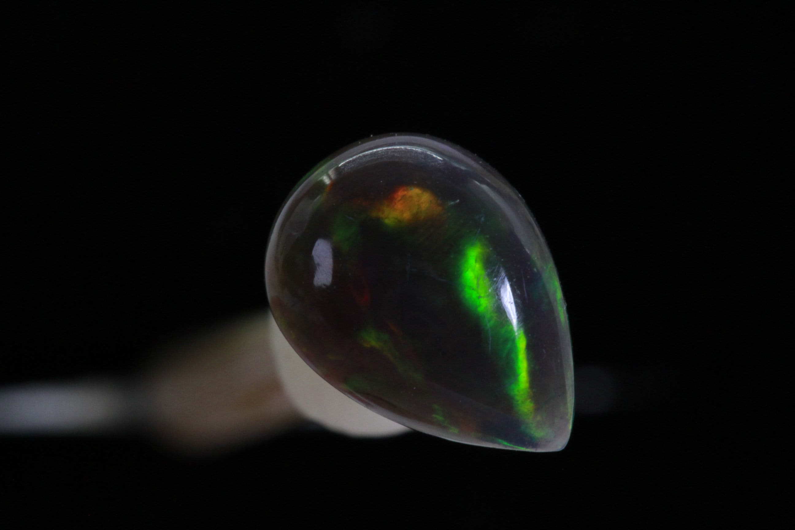 Ethiopian Black Welo Opal: Pear Cut Cabochon Gemstone