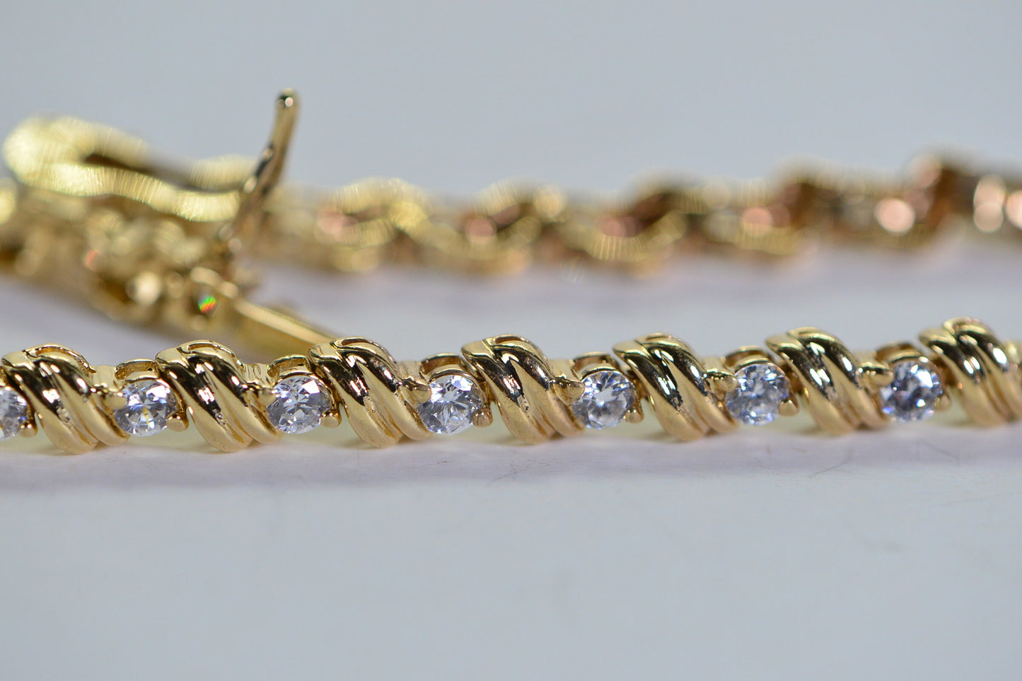 Simulated Diamond Tennis Bracelet: 18K Yellow Gold Over Sterling Silver