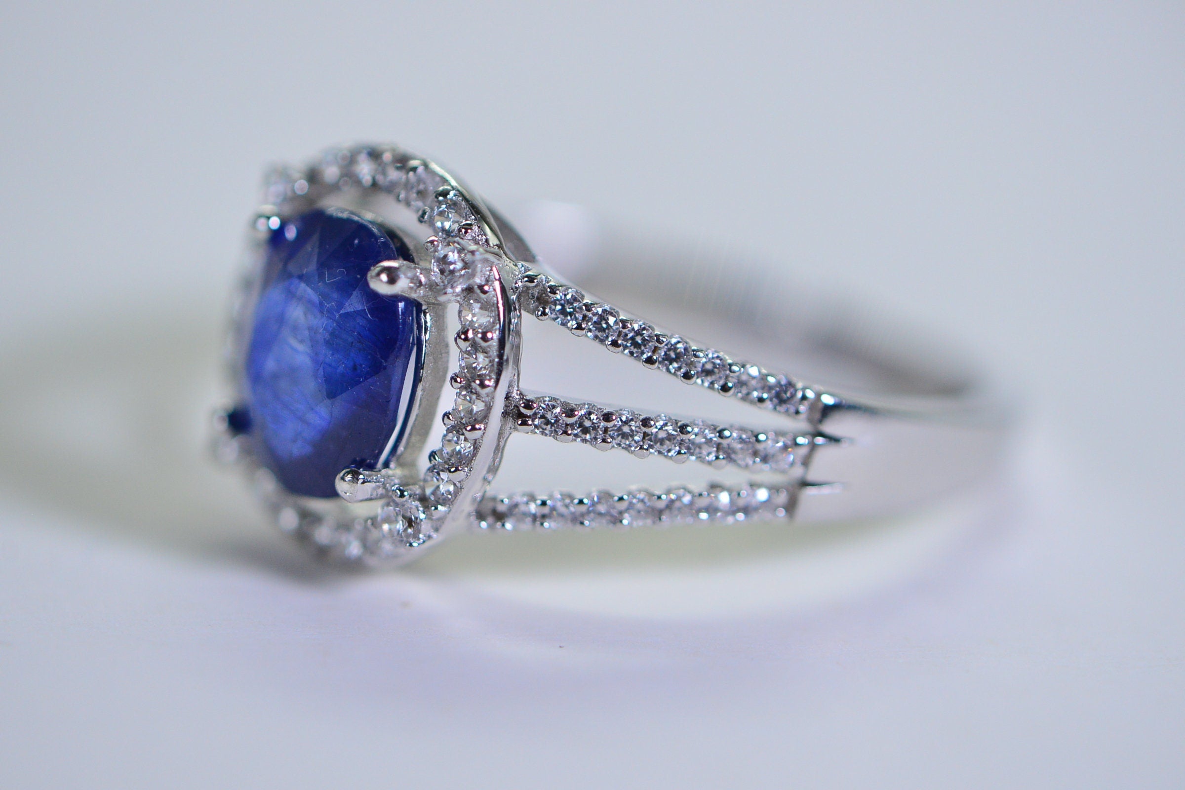 Blue Sapphire Halo Ring: Simulated Diamond, 14K White Gold Over Sterling Silver