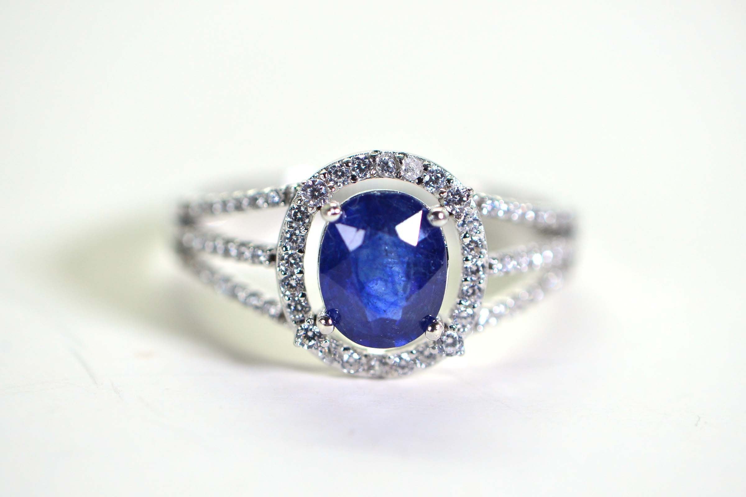 Blue Sapphire Halo Ring: Simulated Diamond, 14K White Gold Over Sterling Silver