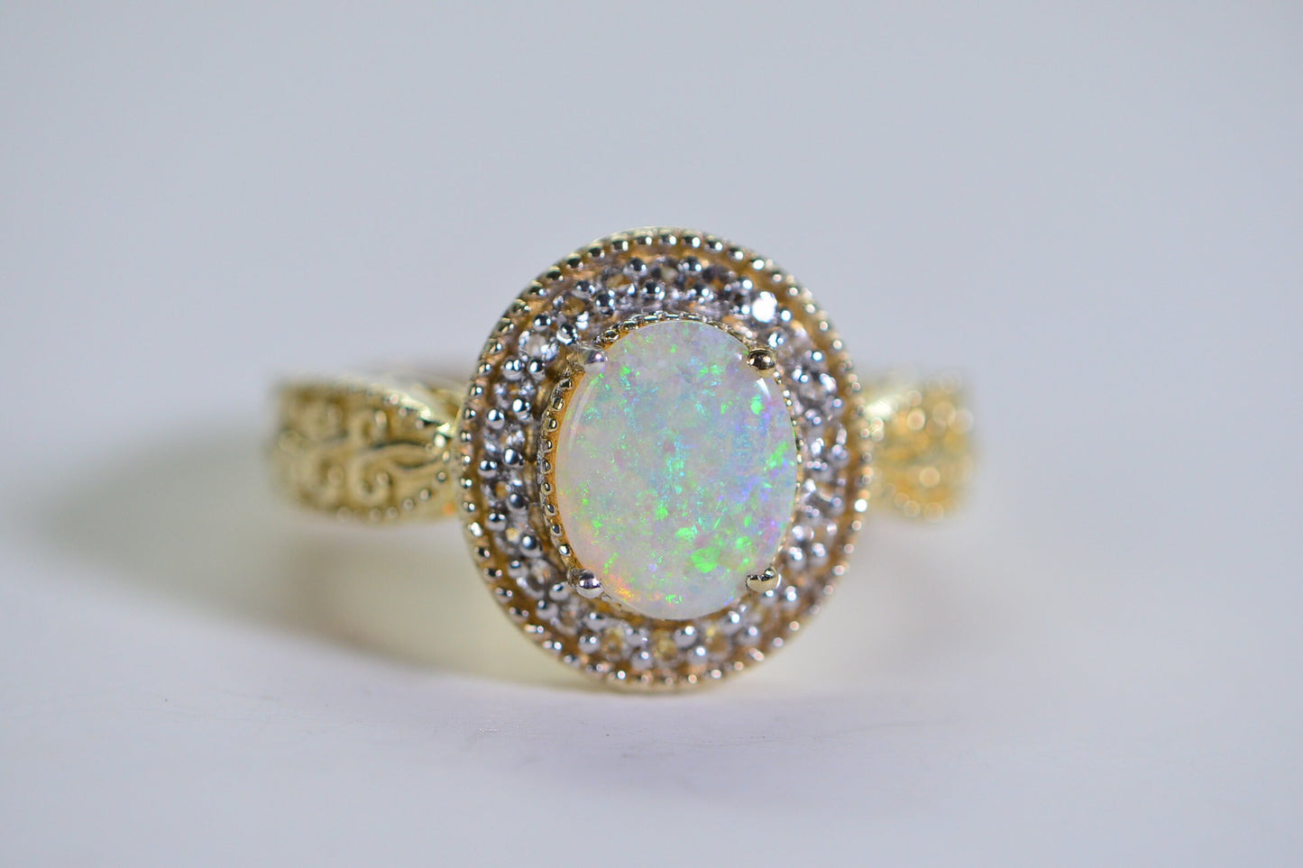 Australian White Opal Ring: Simulated Diamond Halo, 14K Gold Over Sterling Silver