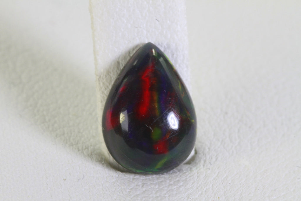Ethiopian Black Welo Opal: Pear Cut Cabochon Gemstone