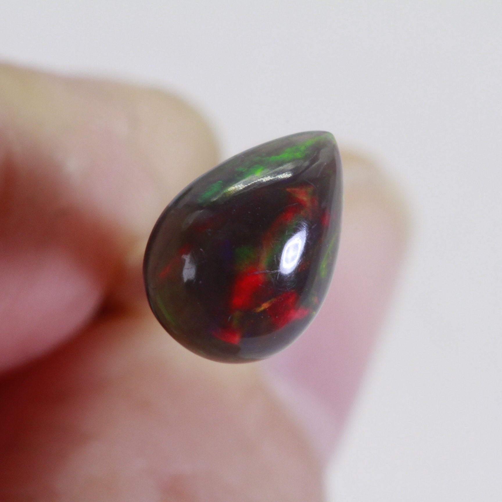 Ethiopian Black Welo Opal: Pear Cut Cabochon Gemstone