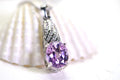 Natural Kunzite Pendant: Sterling Silver, Color Change Gemstone