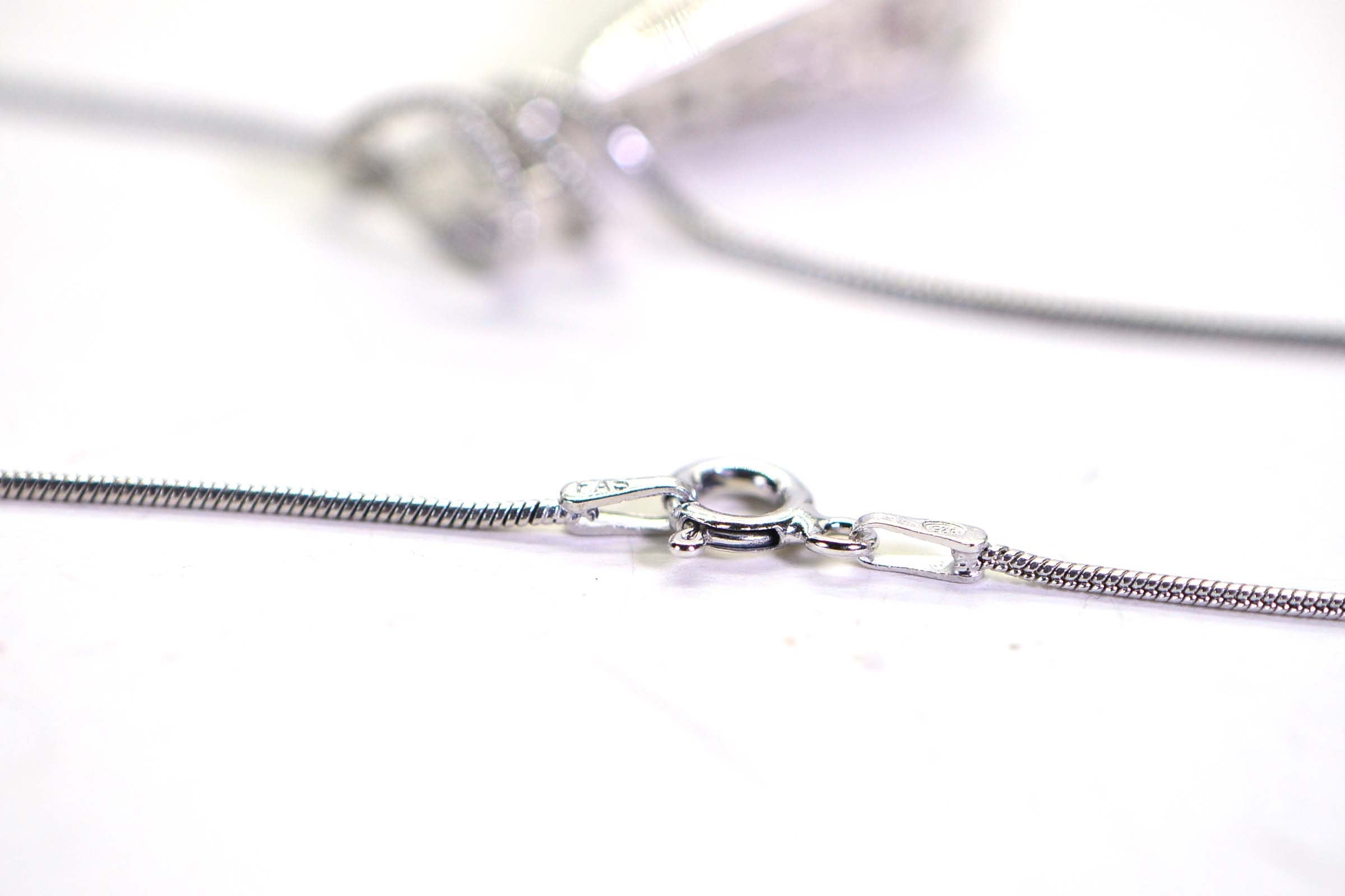 Natural Kunzite Pendant: Sterling Silver, Color Change Gemstone