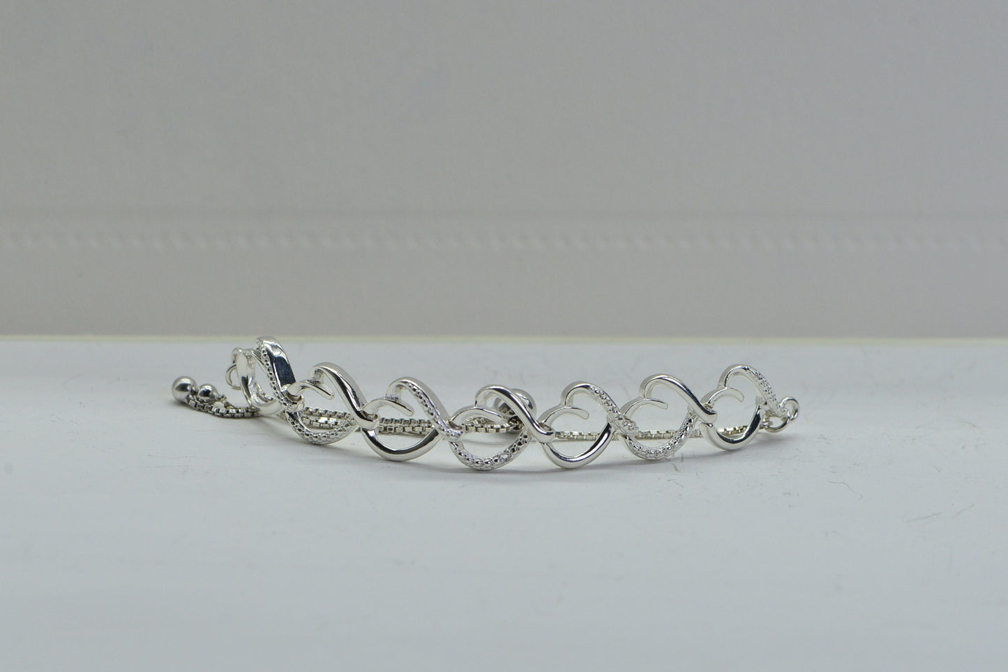 Diamond Heart Tennis Bracelet: Sterling Silver Bolo Bracelet