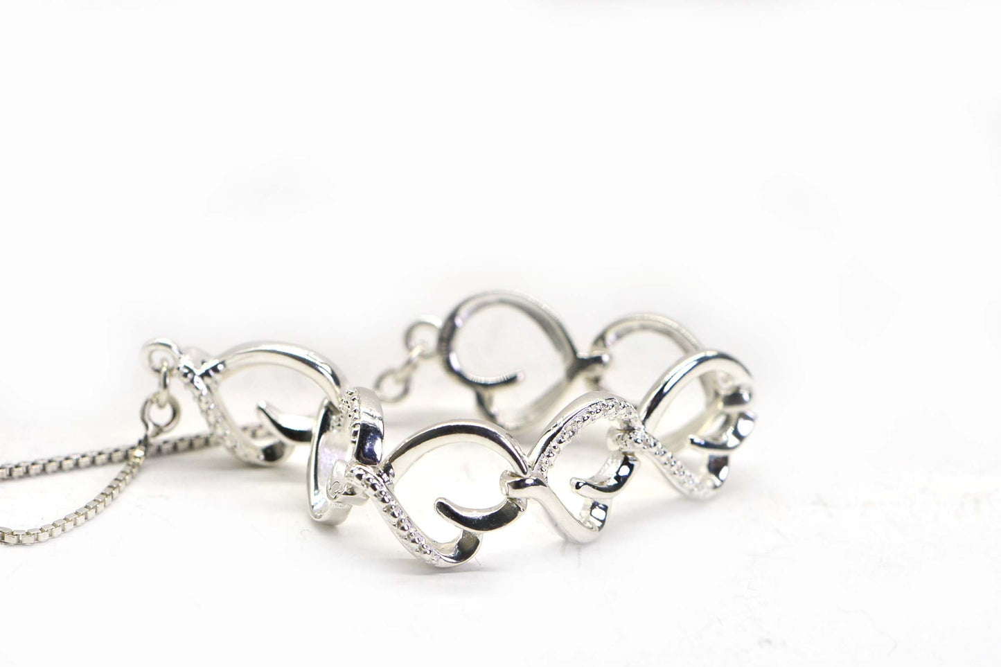 Diamond Heart Tennis Bracelet: Sterling Silver Bolo Bracelet