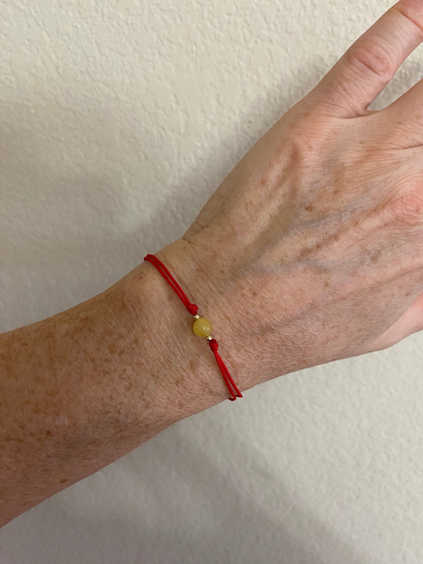 Yellow Burma Jade Bracelet: 14K Gold Beads, Red String of Fate