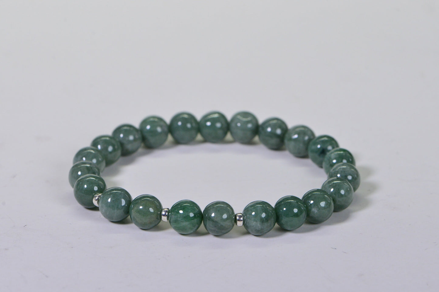 Burmese Jade Bracelet: 9.5mm Deep Green Round Beaded Stretch Bracelet