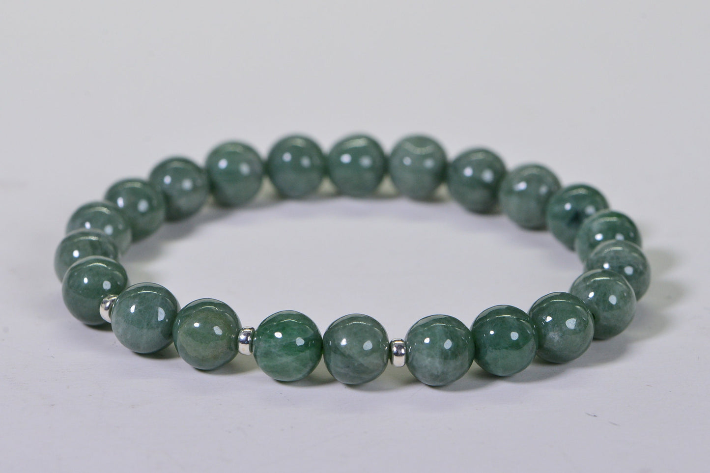 Burmese Jade Bracelet: 9.5mm Deep Green Round Beaded Stretch Bracelet