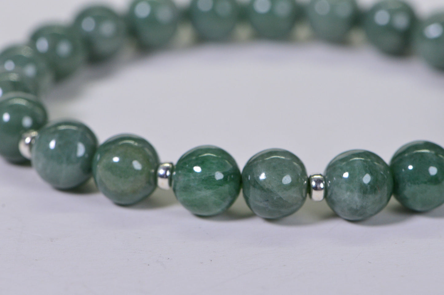 Burmese Jade Bracelet: 9.5mm Deep Green Round Beaded Stretch Bracelet