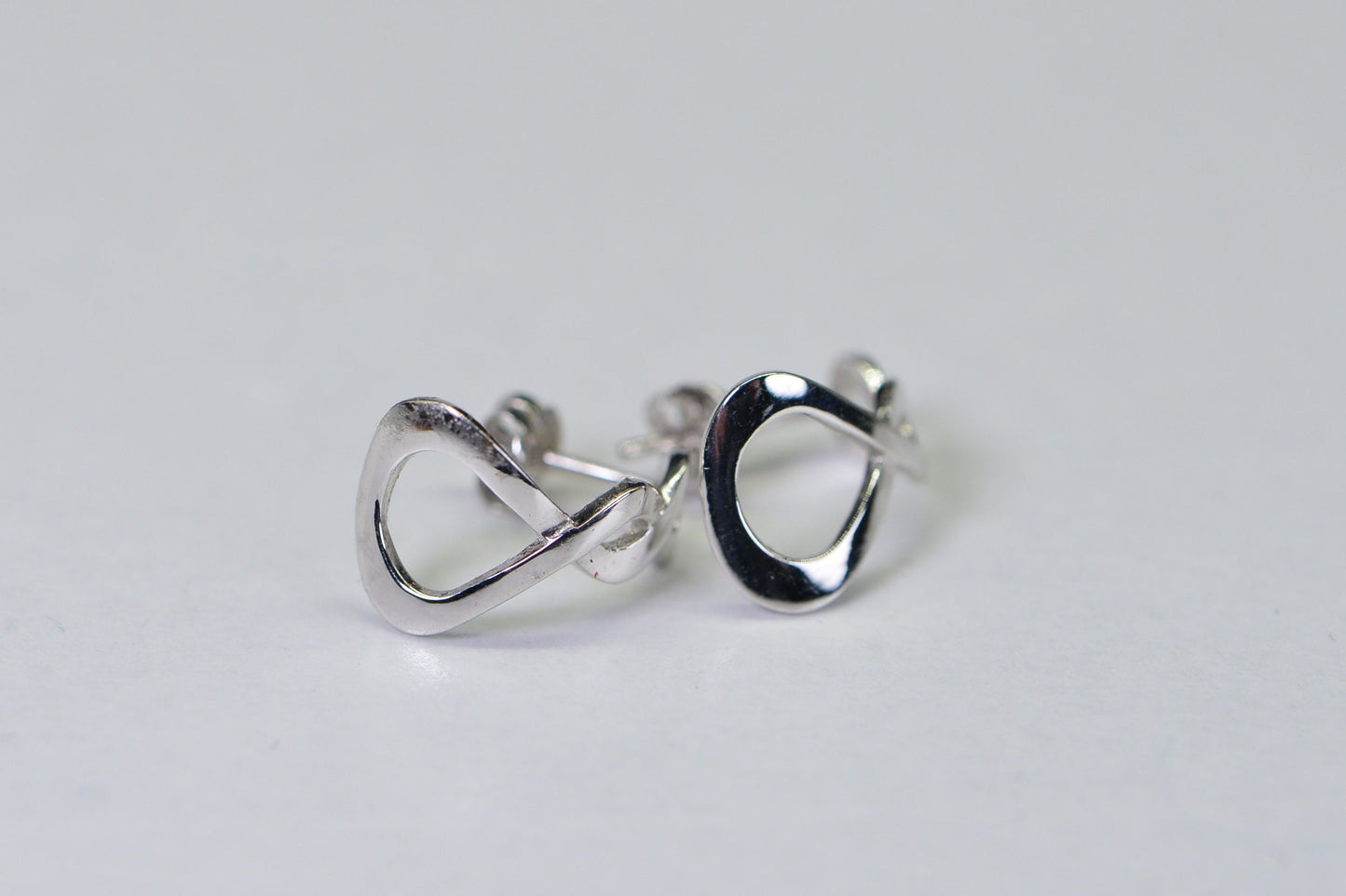 18K White Gold Infinity Stud Earrings: Dainty Twist Design