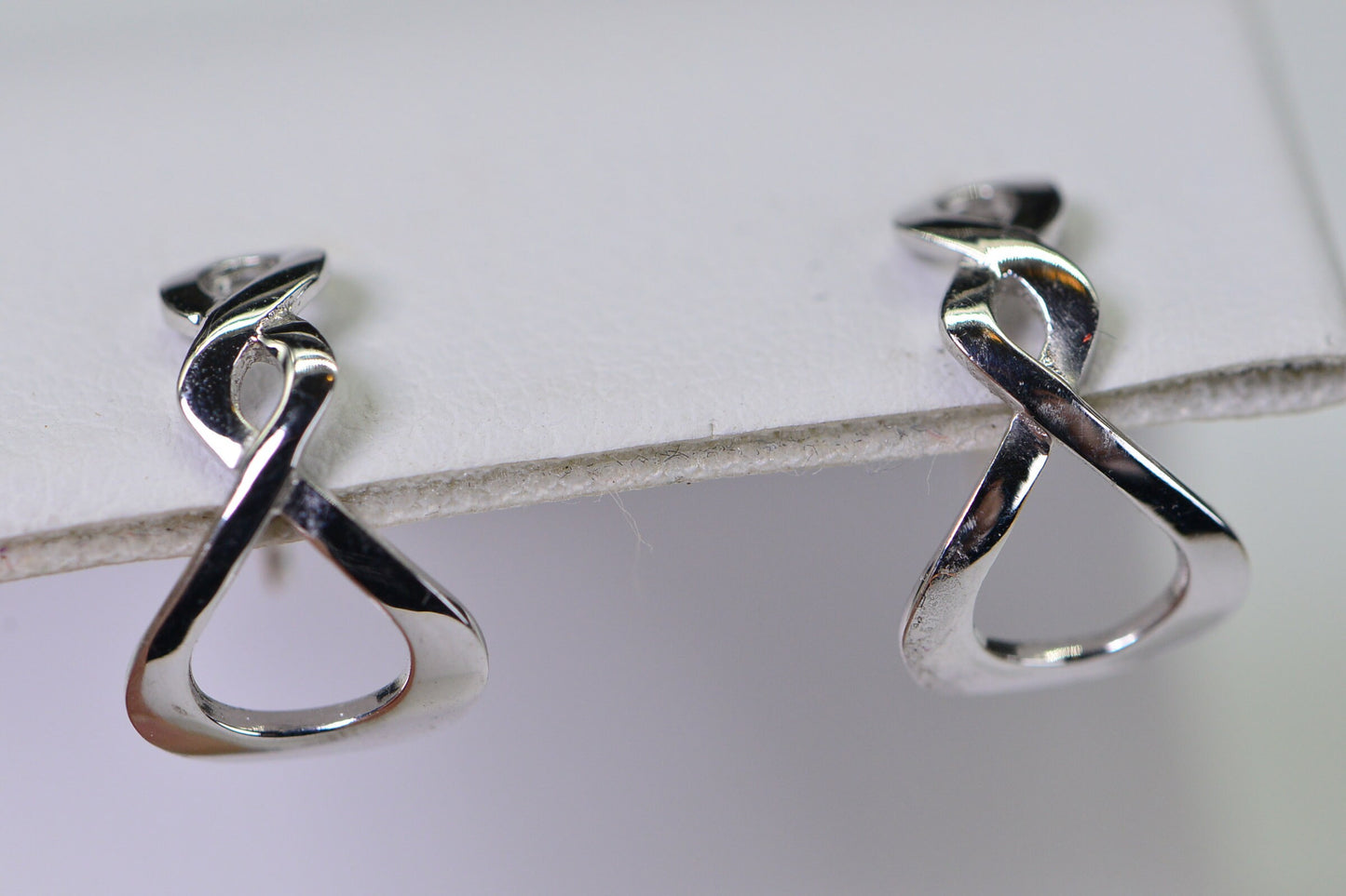 18K White Gold Infinity Stud Earrings: Dainty Twist Design
