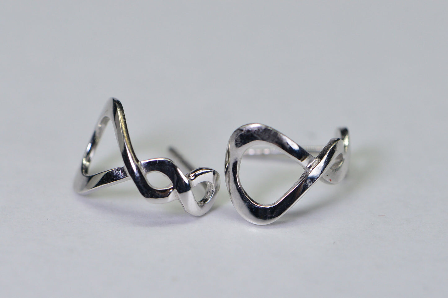 18K White Gold Infinity Stud Earrings: Dainty Twist Design