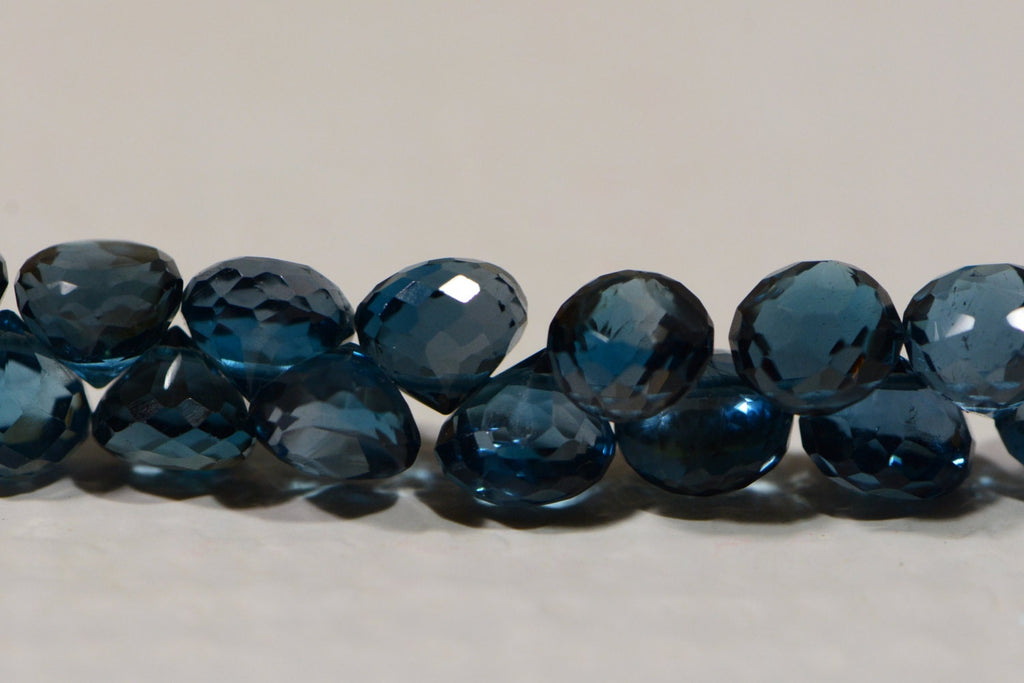 Faceted London Blue Topaz Beads: AAA Onion Cut Gemstone (2pcs)