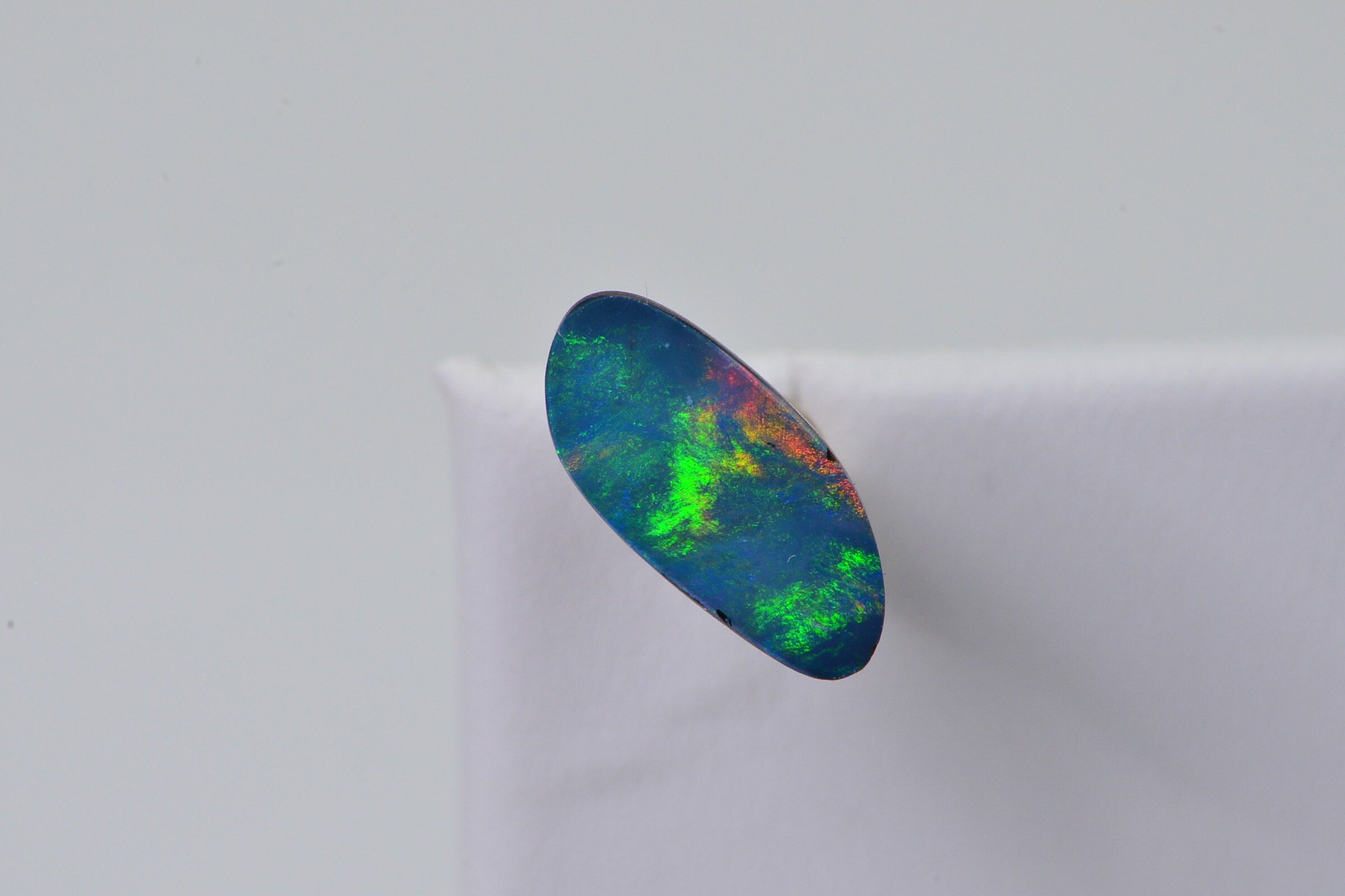 Australian Black Opal Doublet: 1.90 Ct Freeform Teardrop Boulder Opal
