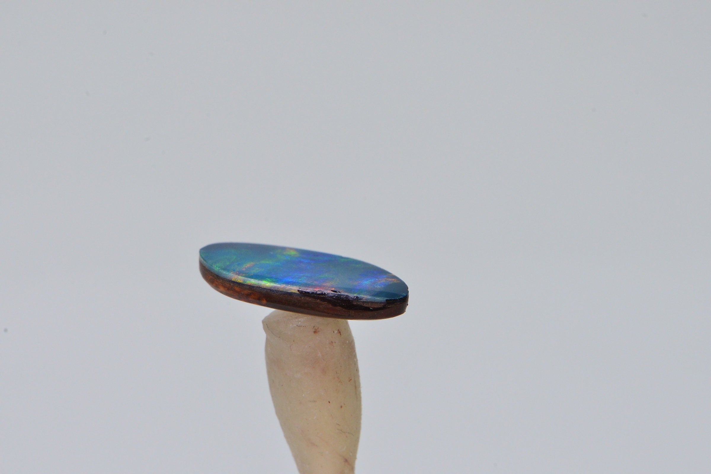 Australian Black Opal Doublet: 1.90 Ct Freeform Teardrop Boulder Opal