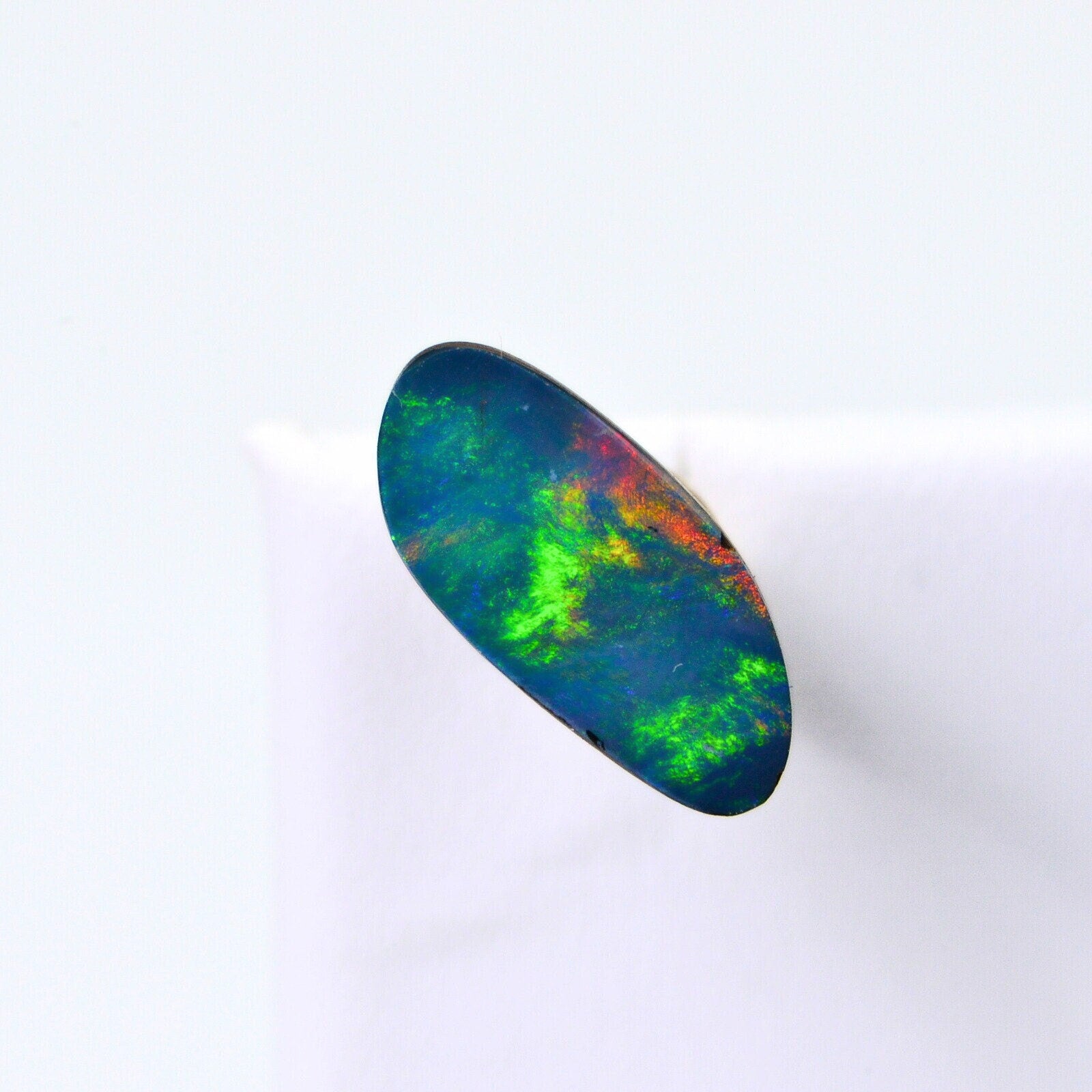 Australian Black Opal Doublet: 1.90 Ct Freeform Teardrop Boulder Opal