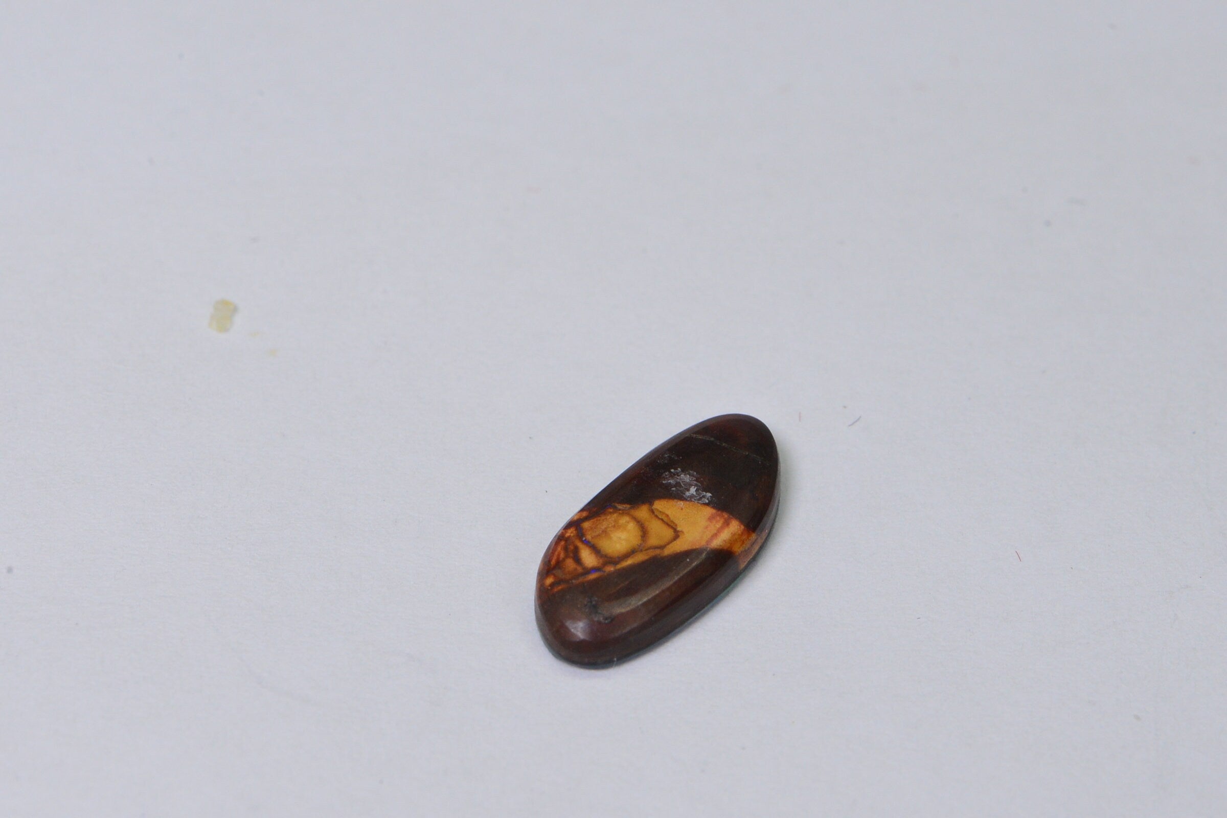 Australian Black Opal Doublet: 1.90 Ct Freeform Teardrop Boulder Opal