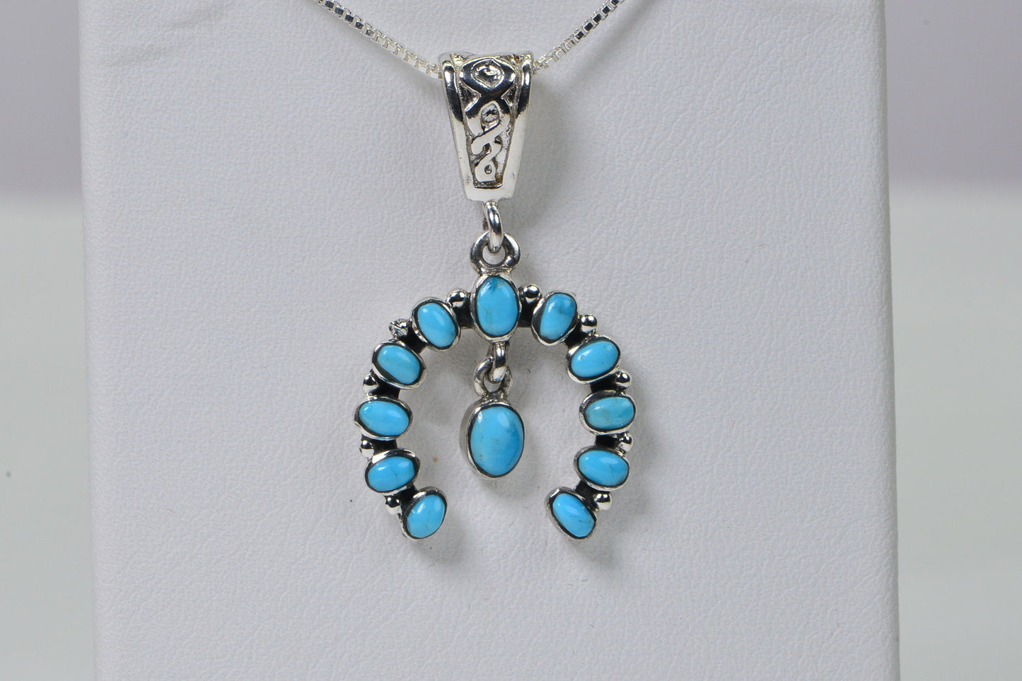 Sleeping Beauty Turquoise Pendant: Sterling Silver Squash Blossom Charm