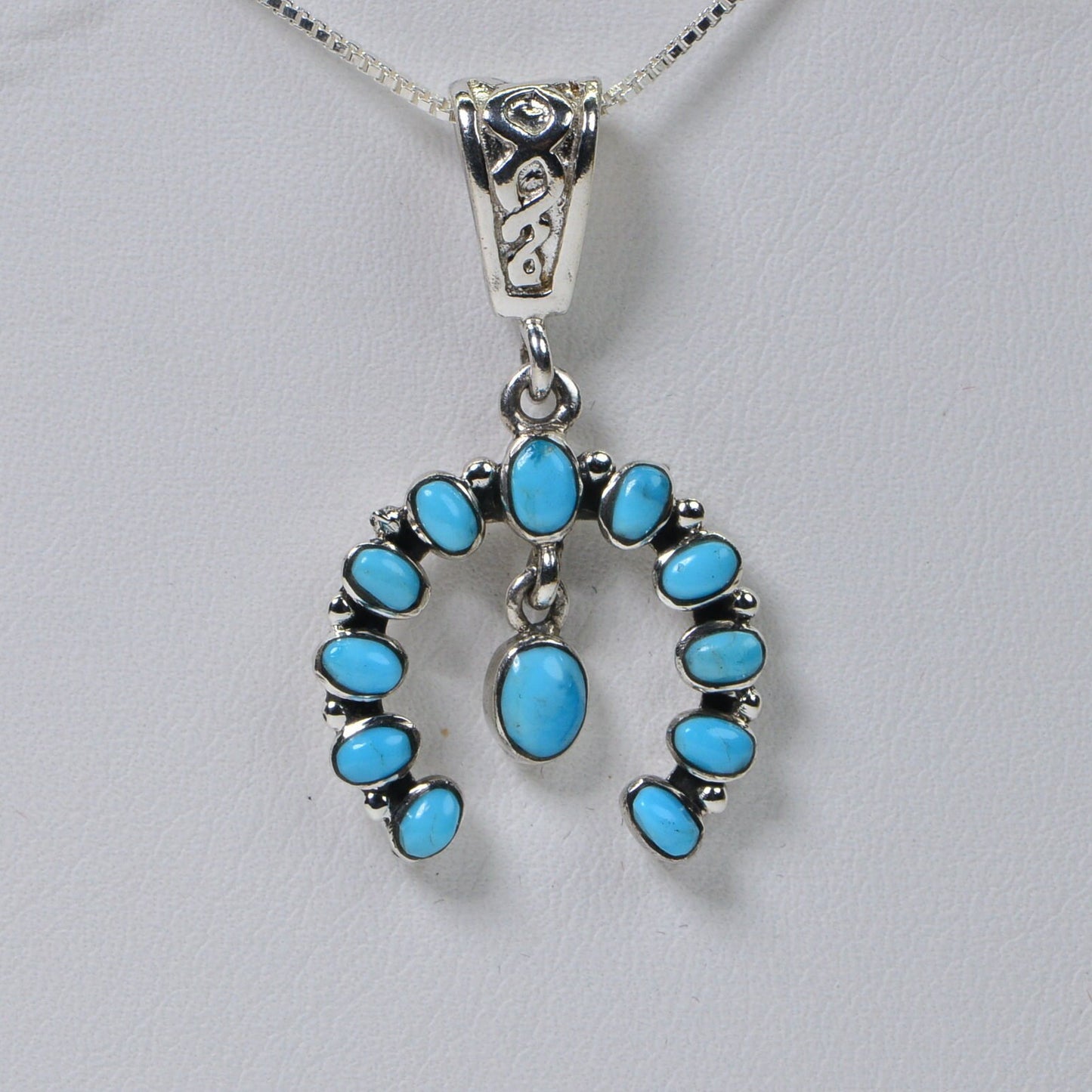 Sleeping Beauty Turquoise Pendant: Sterling Silver Squash Blossom Charm