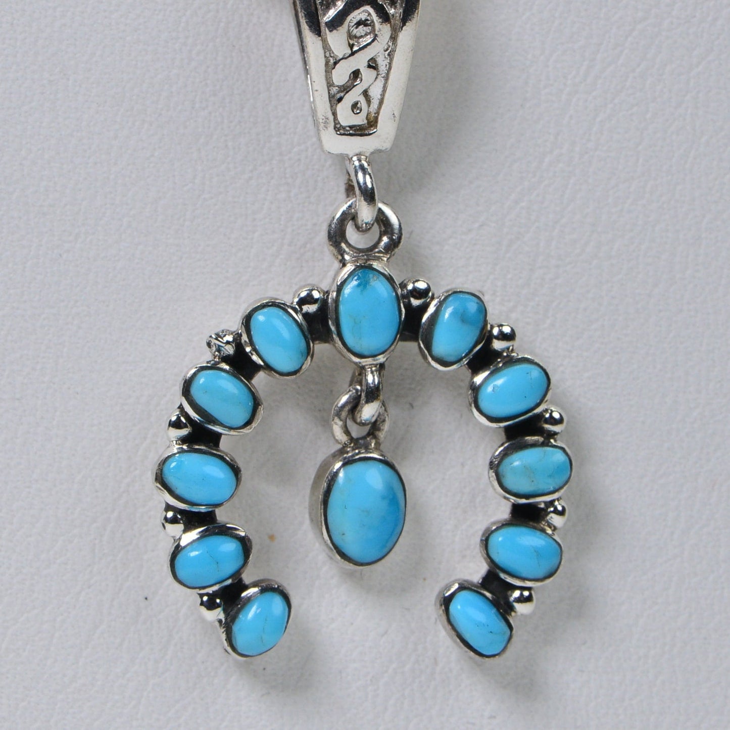 Sleeping Beauty Turquoise Pendant: Sterling Silver Squash Blossom Charm