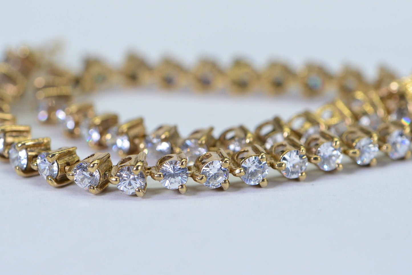 Simulated Diamond Tennis Bracelet: 14K Gold Over Sterling Silver, 8 Inch