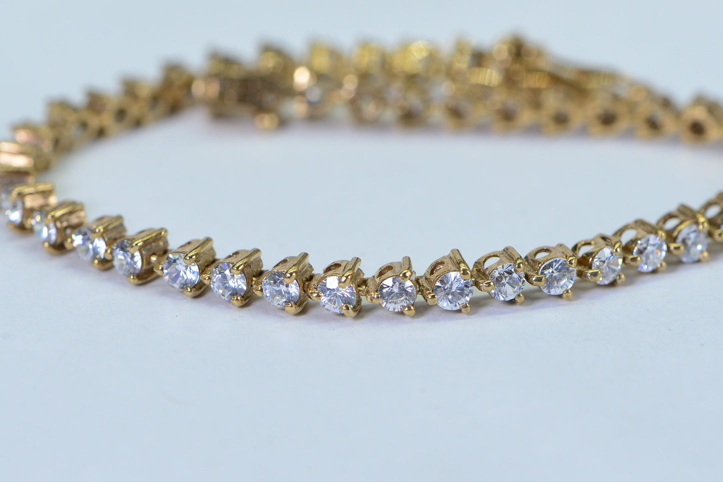 Simulated Diamond Tennis Bracelet: 14K Gold Over Sterling Silver, 8 Inch