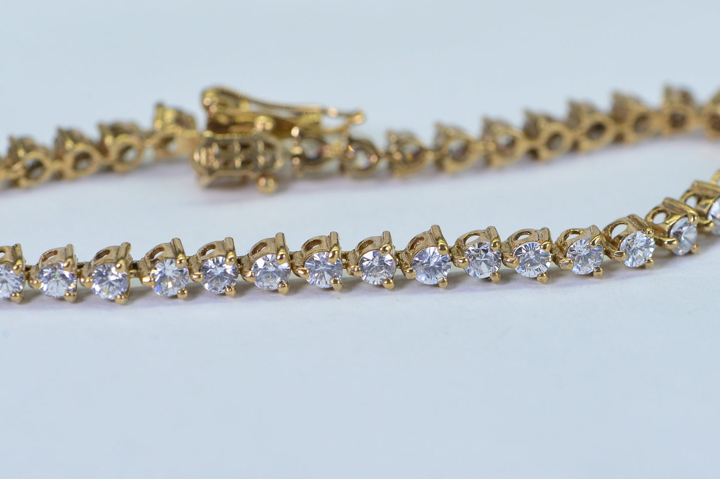 Simulated Diamond Tennis Bracelet: 14K Gold Over Sterling Silver, 8 Inch