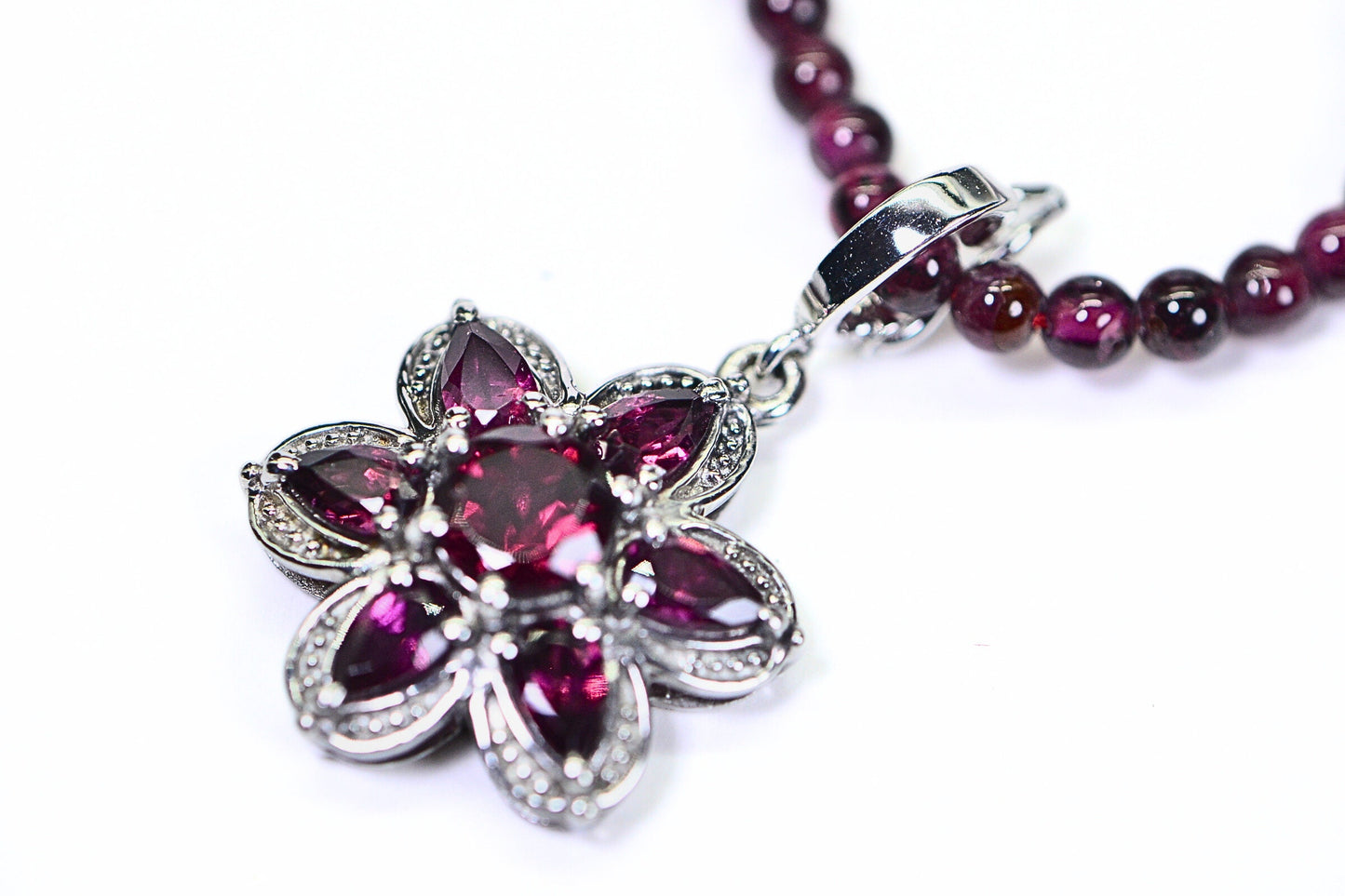 Garnet Flower Pendant: Rhodium Over Sterling Silver, January Birthstone