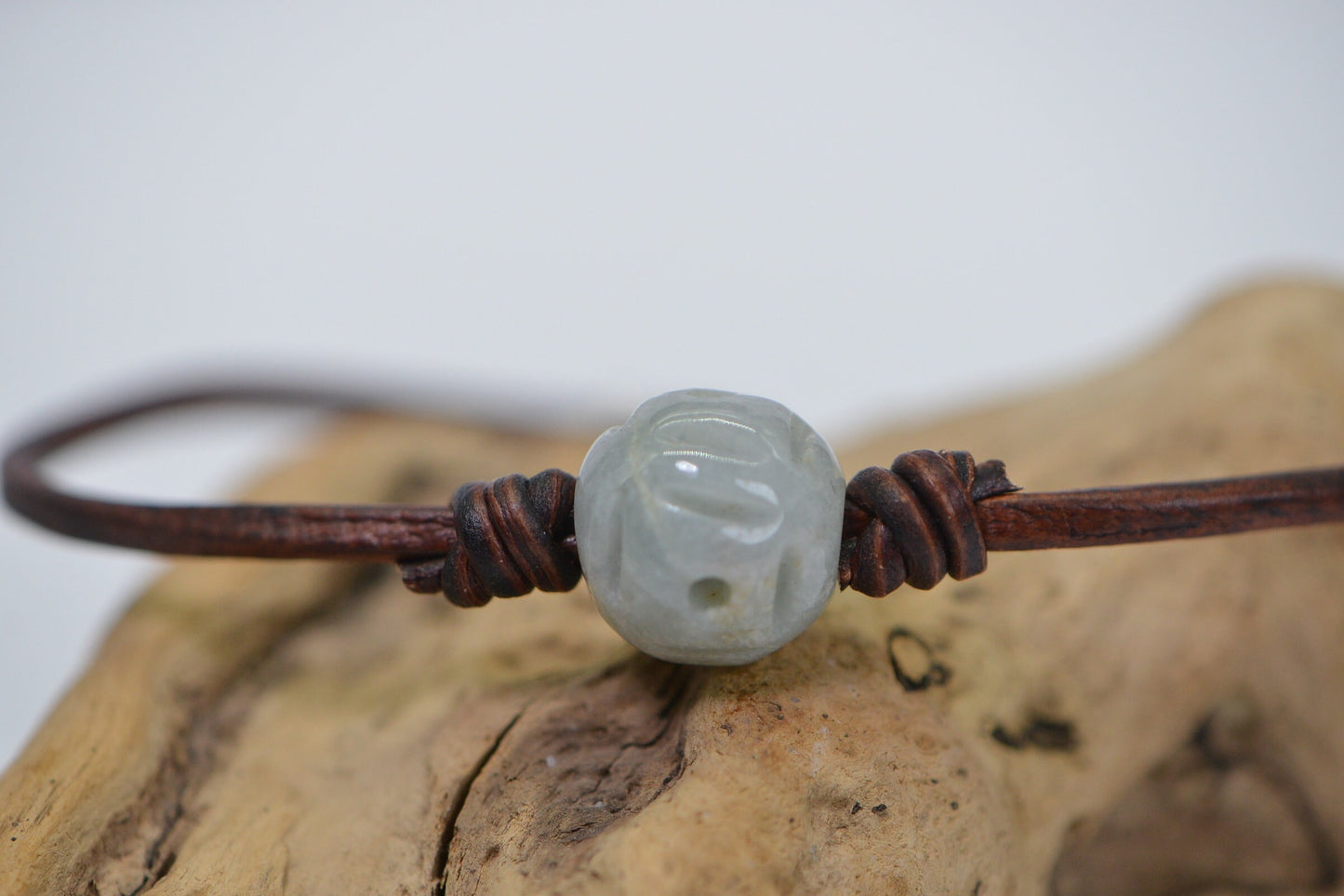 Burma Green Jade Lotus Bracelet: Carved Bead on Leather Cord